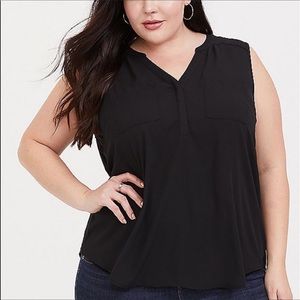 Torrid sleeveless blouse.